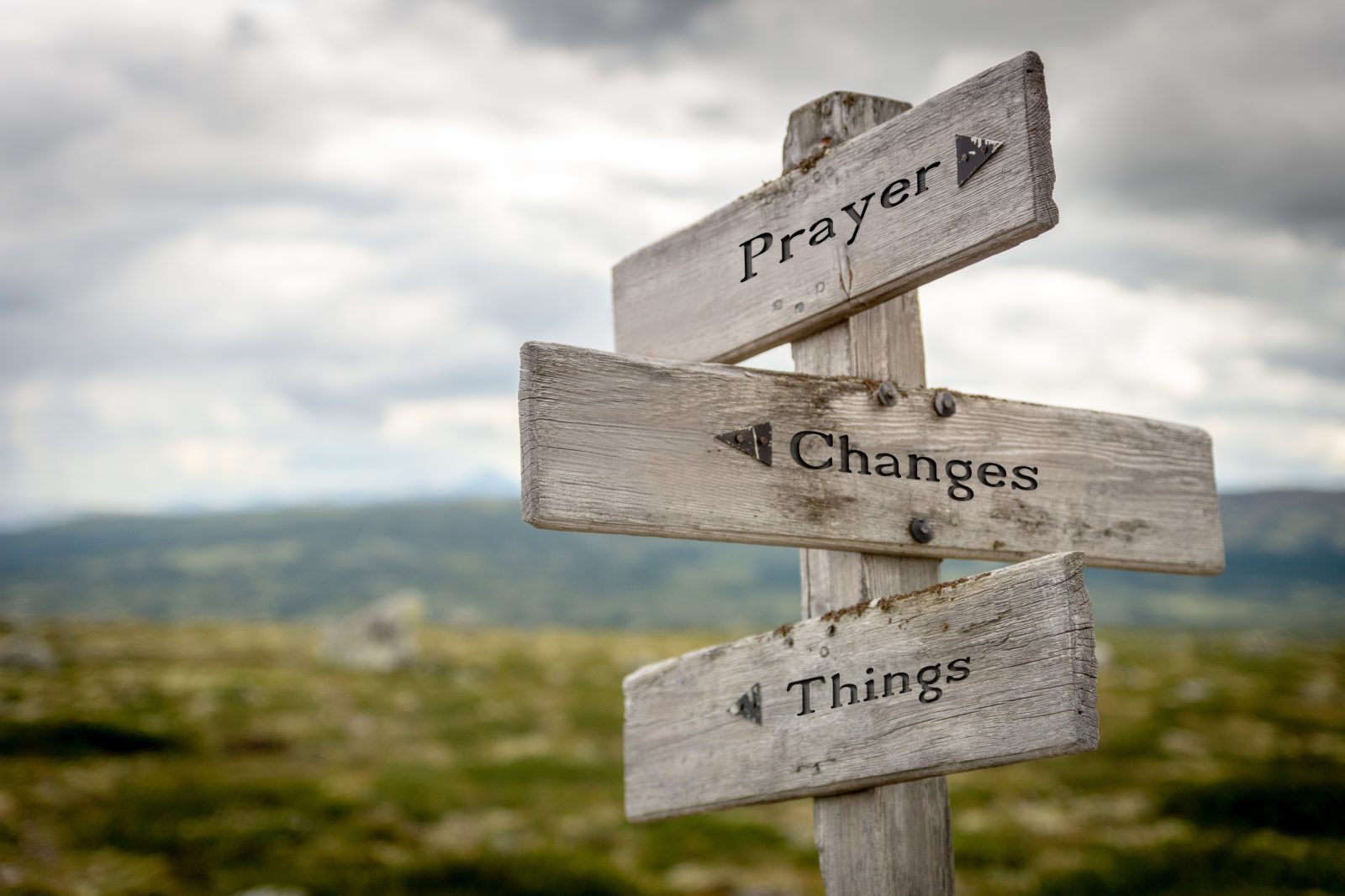 prayer changes things text on signpost