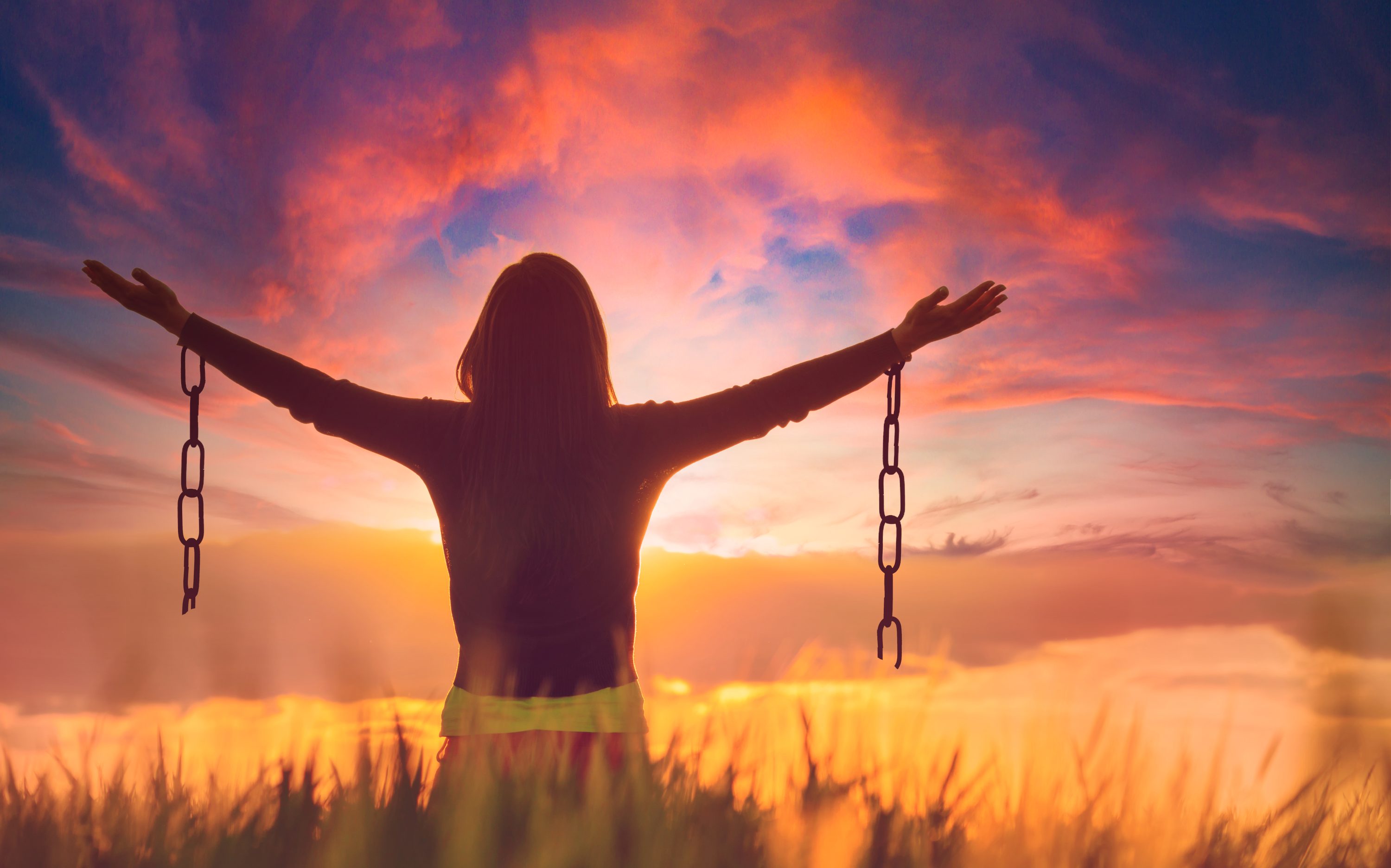 Woman feeling free in a beautiful natural setting.